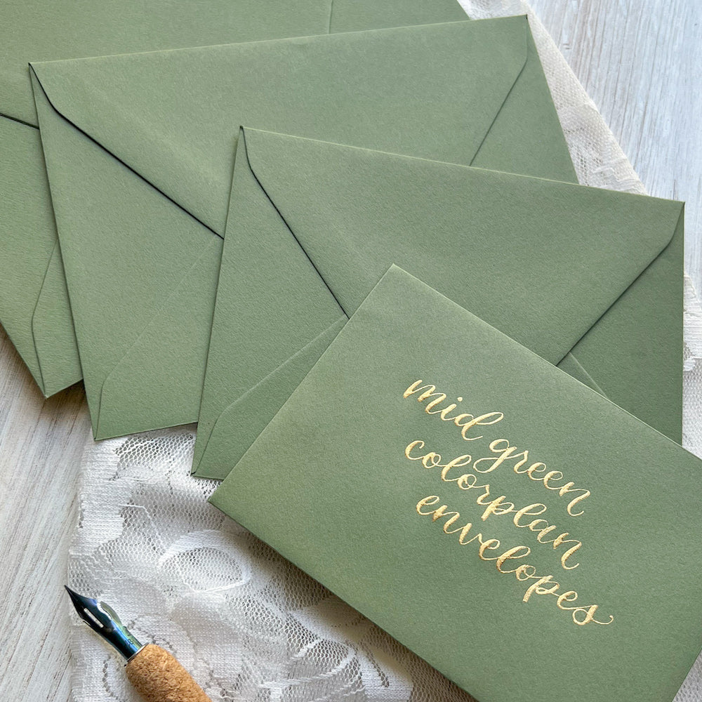 Colorplan mid-green envelopes with gold caligraphy