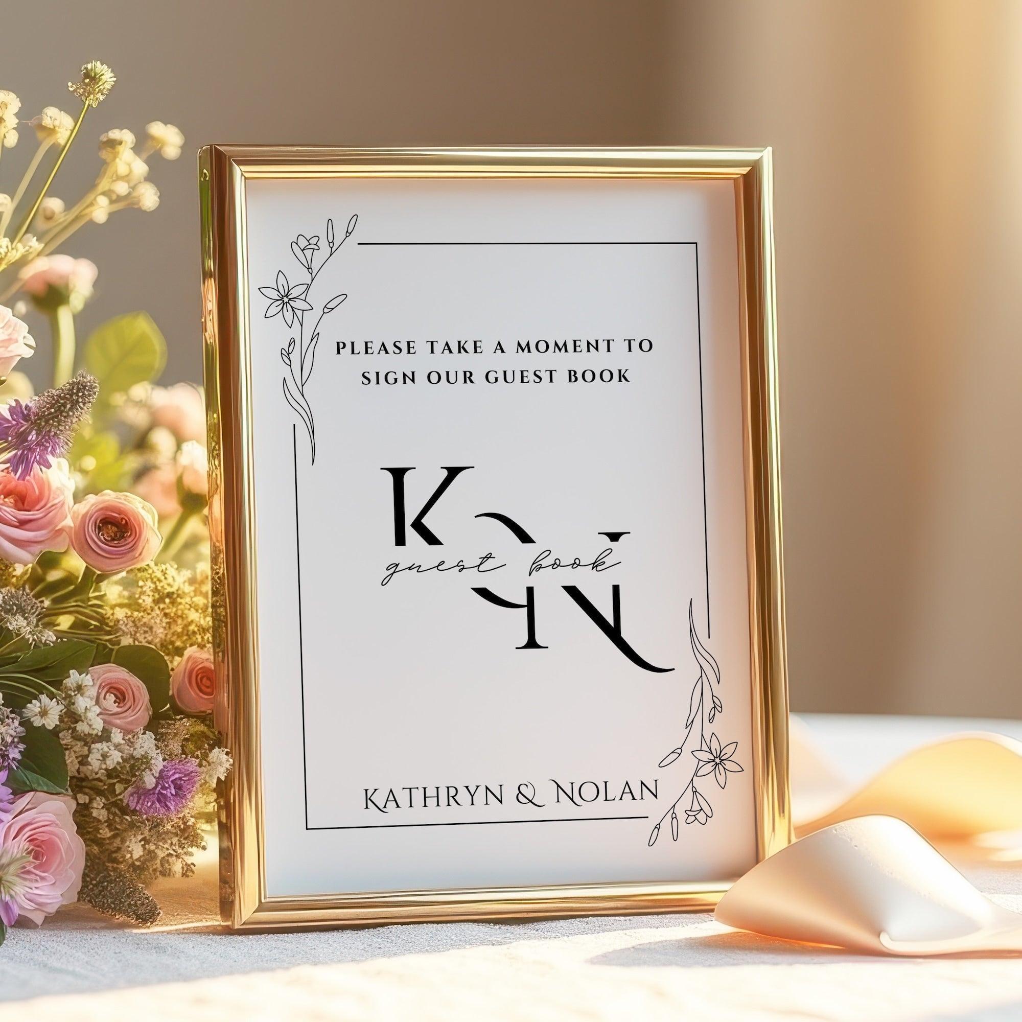 Proof print tabletop event signage in a decorative frame for guest book at a wedding.