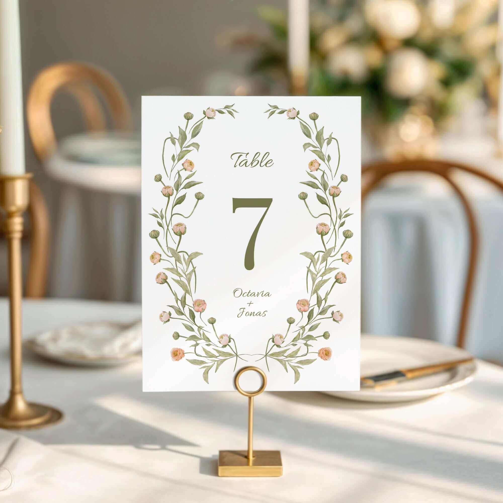 Proof print tabletop event signage featuring an elegant table number display with floral design.