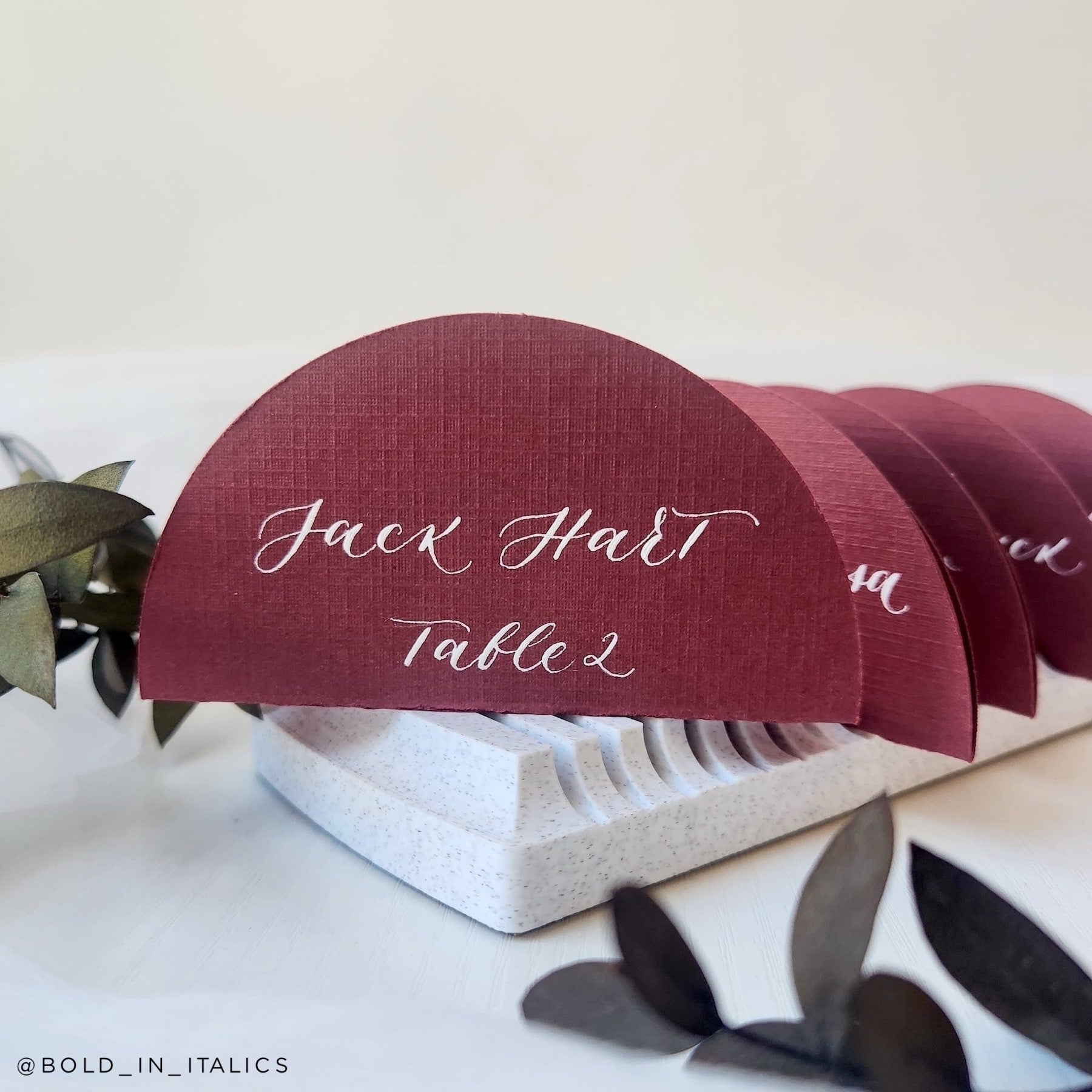 Royaltone Linen Monarch Red rounded wedding calligraphy place cards