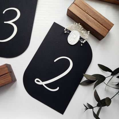 Sirio Ultra Black die cut wedding table numbers by @bold_in_italics